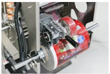 automatic liquid pouch packing machine film release device